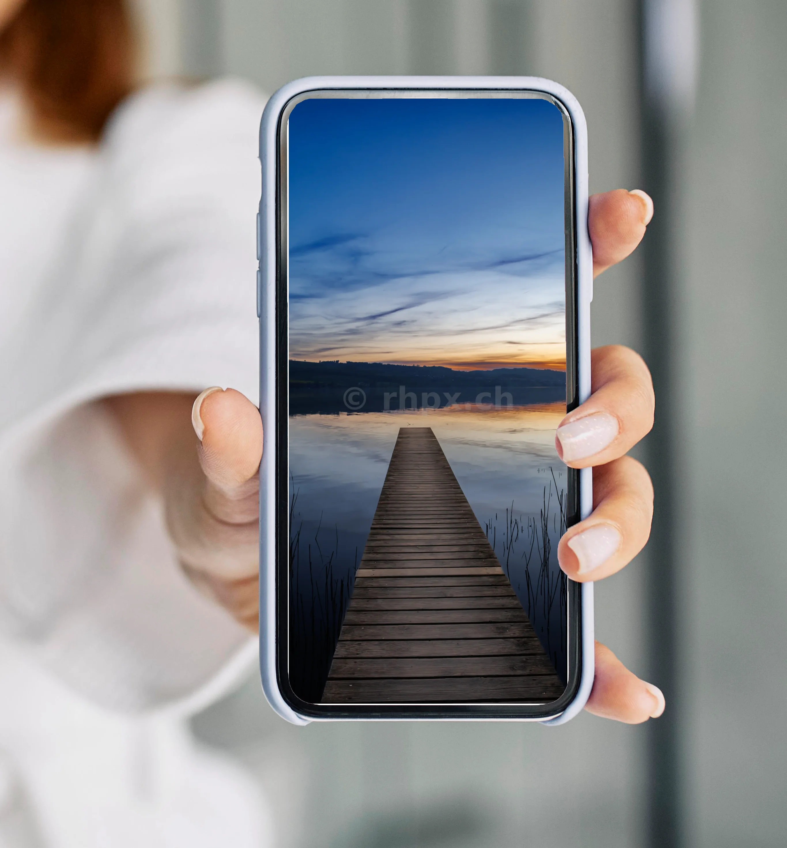 Wooden pier at Lake Sempach at sunset