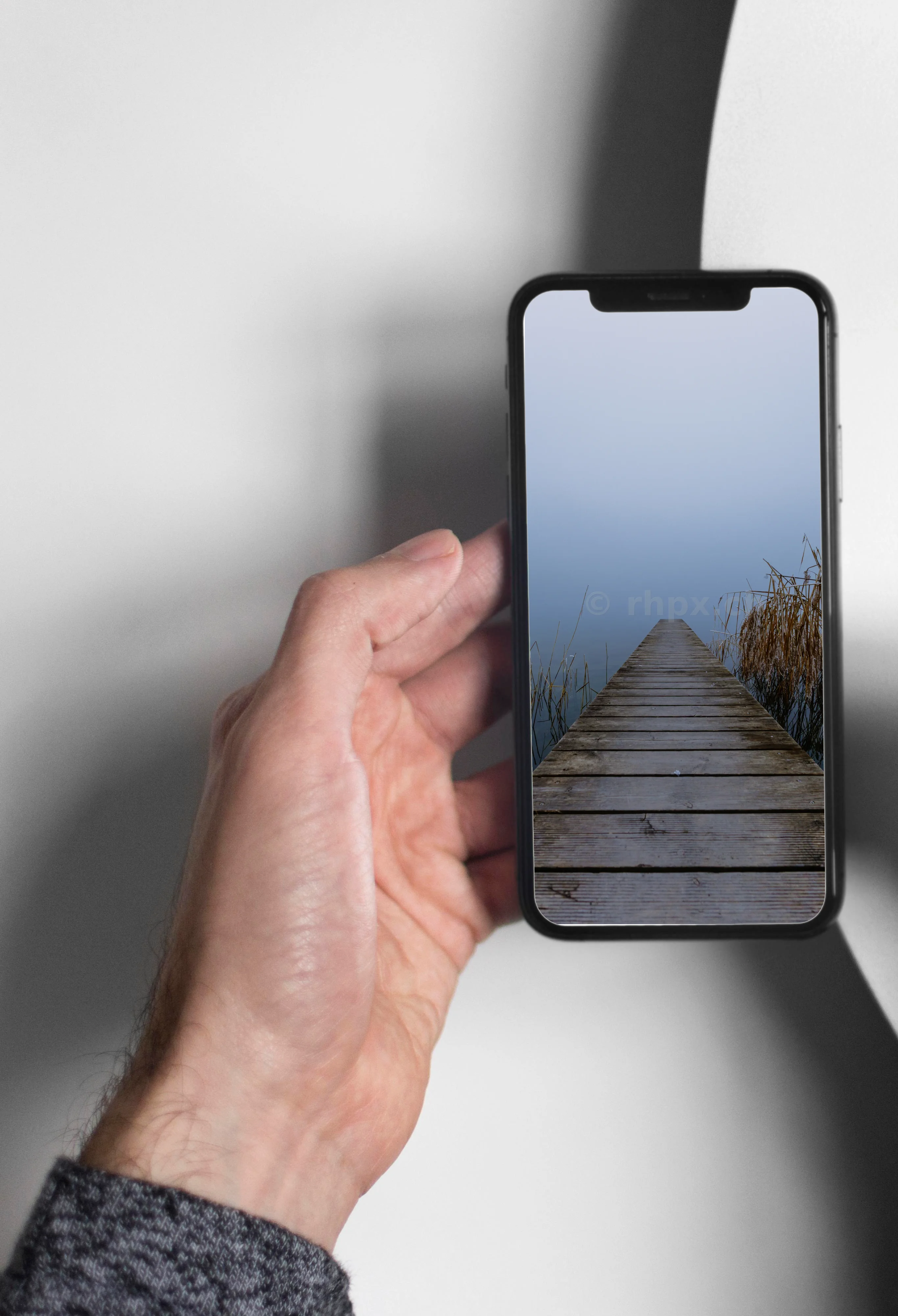 Wooden jetty on Lake Sempach in fog